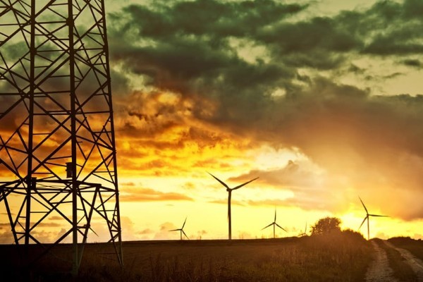 electricity pylon and wind turbine